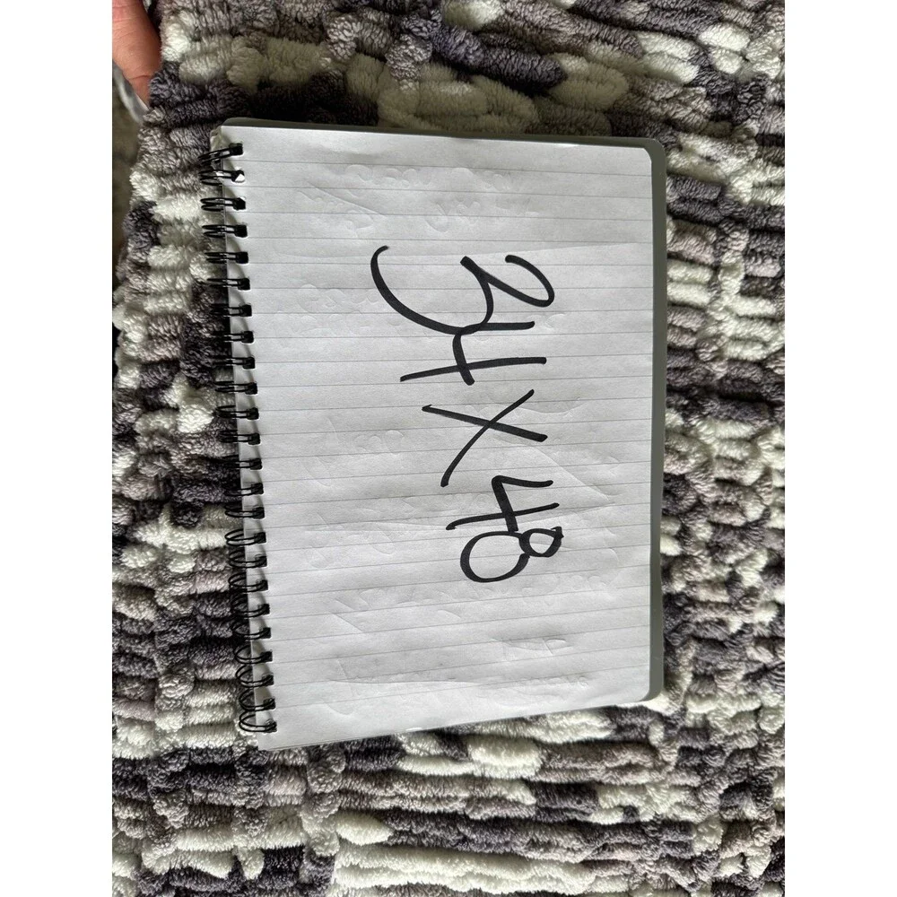 handmade chunky throw features a soft, variegated gray/white chenille 34x48